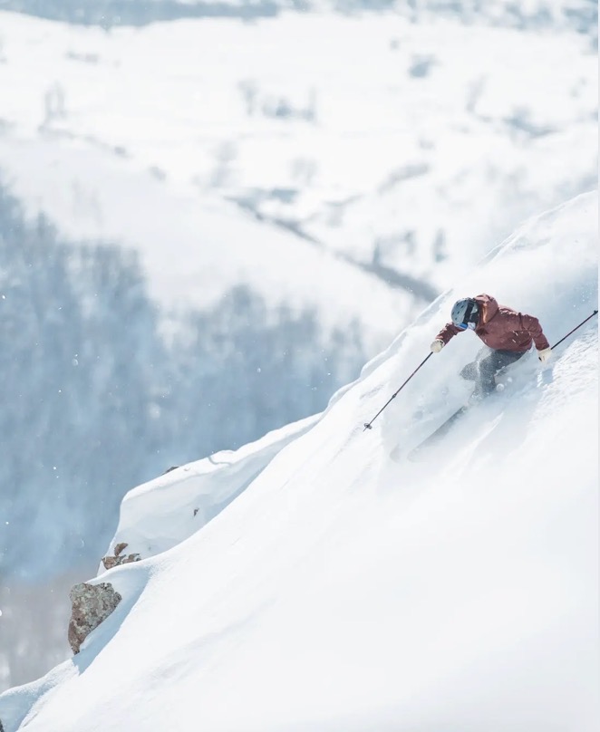 Skier in deep powder at Deer Valley